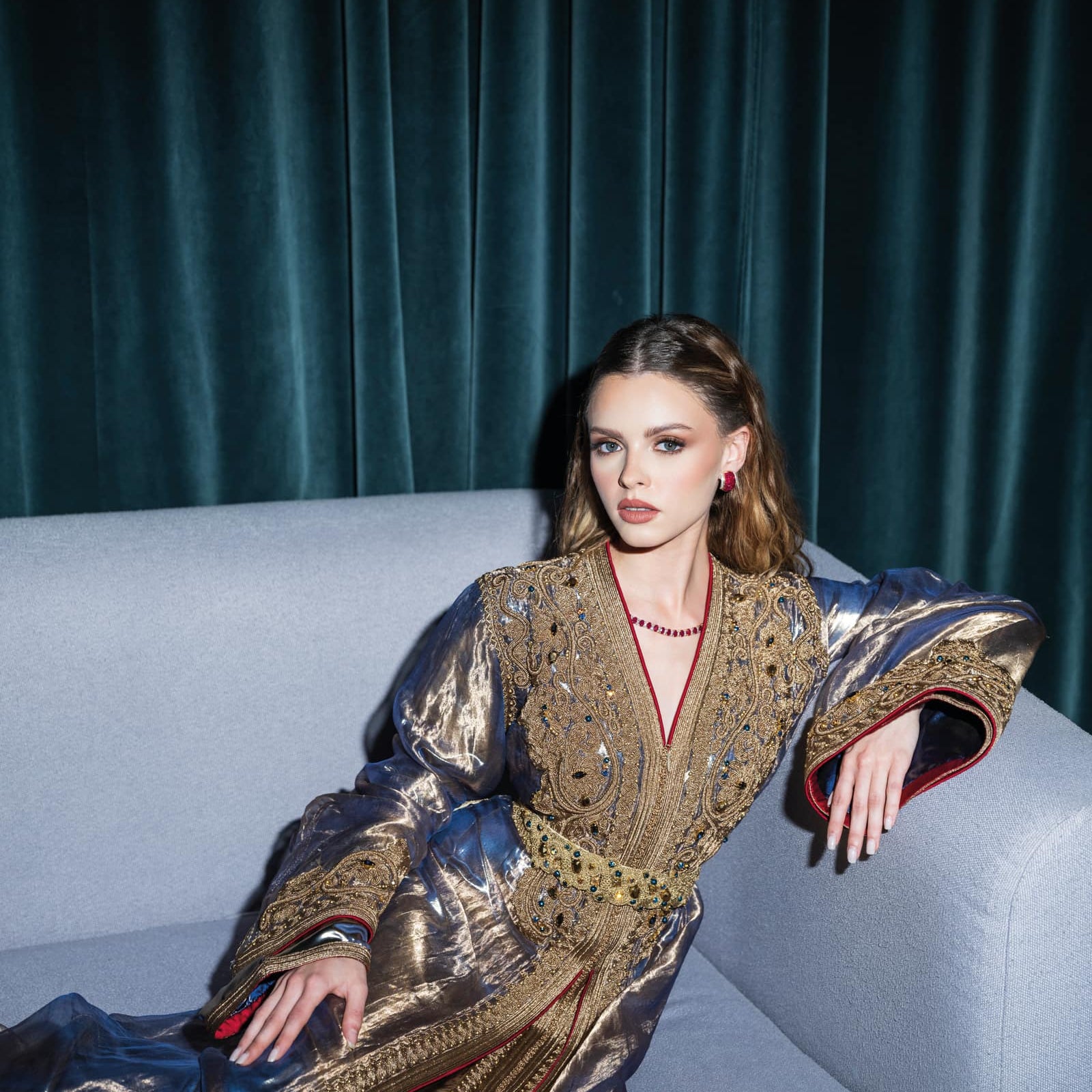 Blue gold Moroccan kaftan with metallic fabric and ornate embroidery detail